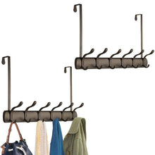 Load image into Gallery viewer, Top rated mdesign decorative over door long easy reach 12 hook metal storage organizer rack to hang jackets coats hoodies clothing hats scarves purses leashes bath towels robes 2 pack bronze